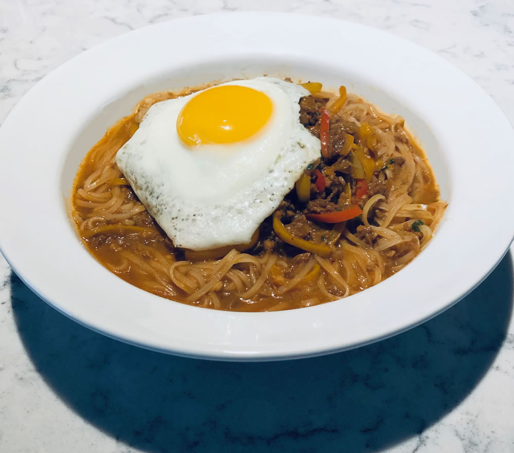 Korean inspired vegetarian spicy noodle bowl.